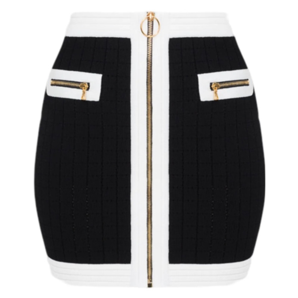 Balmain mini skirt with gold accents. (New)